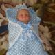 Pletená vypouštěcí obálka pro novorozence s fotkami a videem